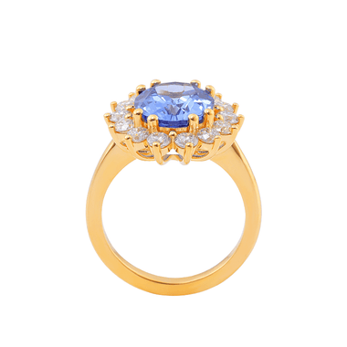 Oval Cut Lab Grown Blue Sapphire with Small Round White Moissanite Yellow Gold Ring