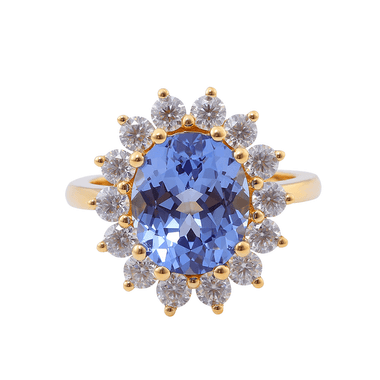 Oval Cut Lab Grown Blue Sapphire with Small Round White Moissanite Yellow Gold Ring