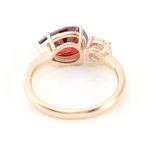 Pear Cut Lab Grown Ruby with Round Cut White Moissanite Toi et Moi Yellow Gold Ring