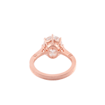 Oval Cut Moissanite with Small Accent Stones Rose Gold Ring