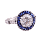 Round Cut White Moissanite with Trapezoid Blue Moissanite Halo with Milgrain and Side Stones White Gold Ring