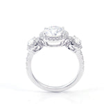 Round Brilliant Cut Moissanite with Two Round Smaller Side Stones  Pavé White Gold Ring