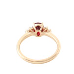 Oval Cut Lab-Grown Ruby with Moissanite Round Side Stones Yellow Gold Ring