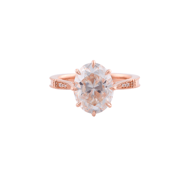 Oval Cut Moissanite with Small Accent Stones Rose Gold Ring