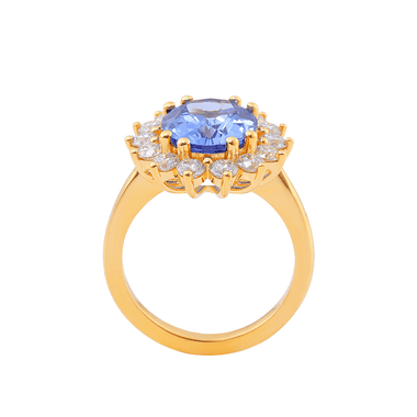 Oval Cut Lab Grown Blue Sapphire with Small Round White Moissanite Yellow Gold Ring