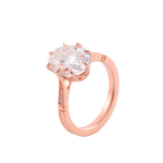 Oval Cut Moissanite with Small Accent Stones Rose Gold Ring