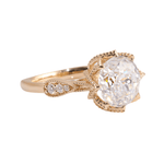 Round Brilliant Cut Moissanite with Accent Stones and Milgrain Yellow Gold Ring