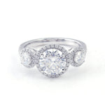 Round Brilliant Cut Moissanite with Two Round Smaller Side Stones  Pavé White Gold Ring