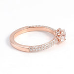 Round Cut Moissanite with Round Side Stones Triple Pave Rose Gold Ring