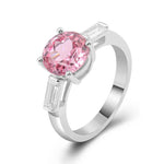 Pink Round Cut Sapphire with Two White Radiant Cut Moissanite White Gold Ring