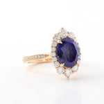 Oval Cut Blue Sapphire Halo Pavé Yellow Gold Ring