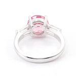 Pink Round Cut Sapphire with Two White Radiant Cut Moissanite White Gold Ring