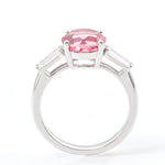 Pink Round Cut Sapphire with Two White Radiant Cut Moissanite White Gold Ring