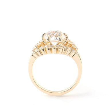 Round Cut Moissanite with Small Moissanite Accent Stones Split Band Yellow Gold Ring