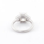 Radiant Cut Moissanite with Trapezoid Side Stones White Gold Ring